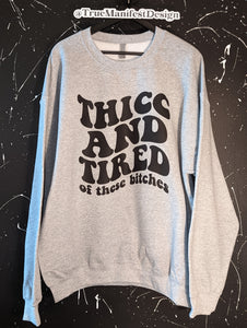 Thicc And Tired Of These Bitches Sweatshirt