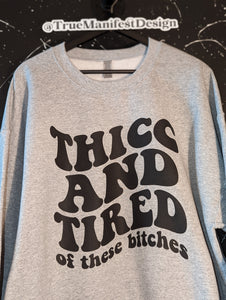 Thicc And Tired Of These Bitches Sweatshirt